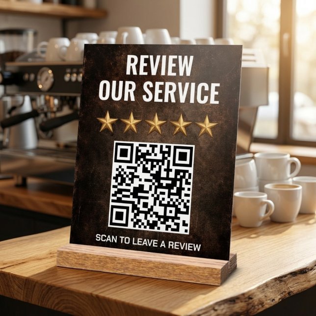 Examen et commentaires du code QR industriel rusti (Rustic industrial acrylic QR code sign with gold stars on a light wood block base.)