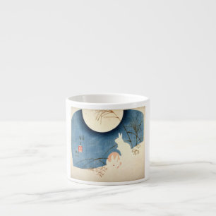 EXPRESSO DEUX LAPINS ET UNE TASSE EN CÉRAMIQUE DE CAFÉ