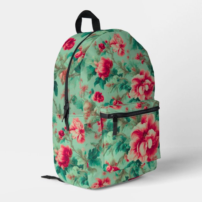 Exquisite Rote Blume und üppige grüne Blätter Bedruckter Rucksack (Rückseitige Ecke links)