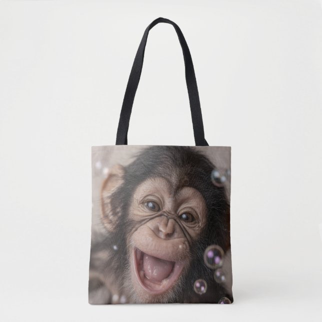 Extremnahe eines glücklichen Babyschimpansen Tasche (Vorderseite)