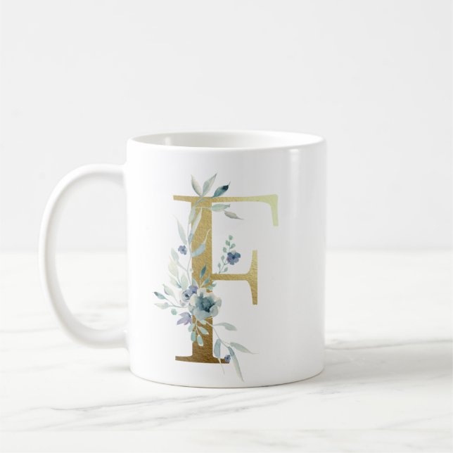 F Goldener Erstling mit blauem Blumenblättern Kaffeetasse (Links)