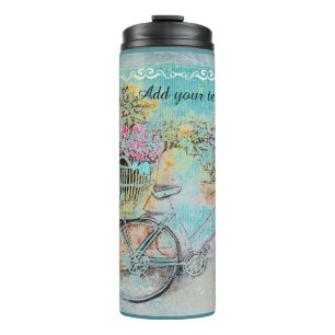 Fahrrad mit Blumenkörben auf blauer Leinwand Thermosbecher