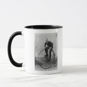 Fahrrad mit großem vorderem Rad Tasse