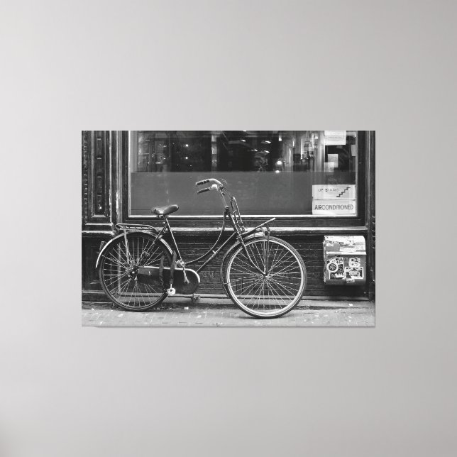 Fahrrad vor dem Schaufenster Leinwanddruck (Vorderseite)