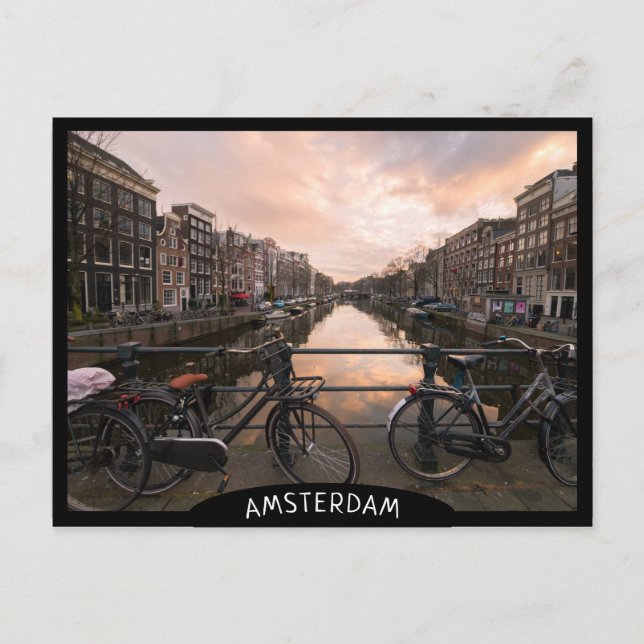 Fahrräder bei Sonnenuntergang in Amsterdam Postkarte (Vorderseite)