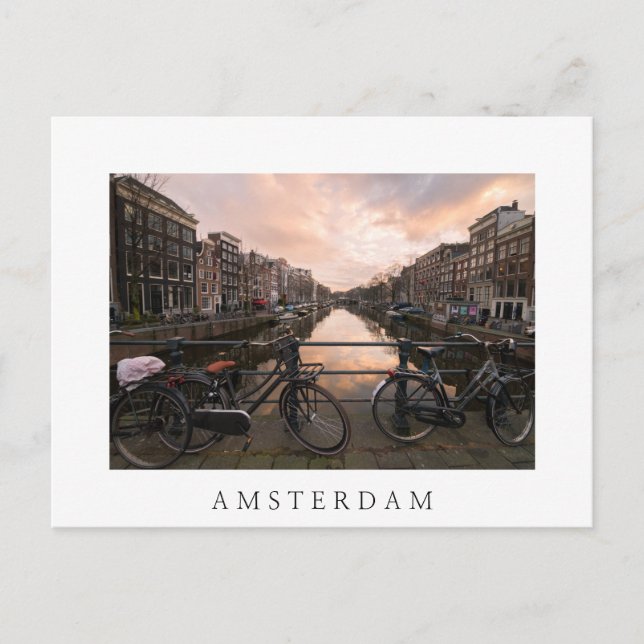 Fahrräder bei Sonnenuntergang in Amsterdam Postkarte (Vorderseite)