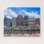 Fahrradhäuser am Amsterdamer Kanal Niederlande<br><div class="desc">Dieses atemberaubende Puzzle mit Stadtmotiv bietet Fahrräder entlang des Amsterdamer Kanals mit Gebäude im Hintergrund. #amsterdam #netherlands #holland #canal #cyclcles #waterfront #canal #europe #travel #adventure #jigsaw #jigsaw #jigsawpuzzle #gifts #fun #stockingstopffers #games #games #games</div>
