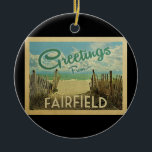 Fairfield Beach Vintage Travel Keramik Ornament<br><div class="desc">Dieses Greetings From Fairfield Vintage Postcard Design verfügt über einen Sandstrand mit einem schönen türkisfarbenen Ozean Wasser und über dem Meer,  einen blauen Himmel mit billigen weißen Wolken. Im Vintage Reisen Stil.</div>
