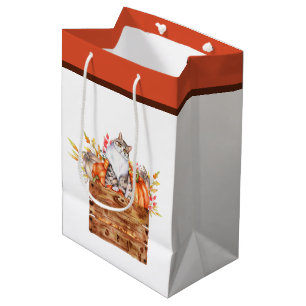 Fallkatze und Kürbis in Kiste Mittlere Geschenktüte