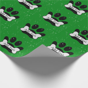 Falsche Dog-Paw-Druck und Knochen auf Grün Geschenkpapier