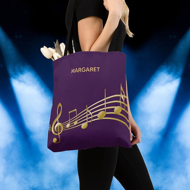 Falsche Gold-Musik-Noten. Wir haben Purple-Backdro Tasche (Von Creator hochgeladen)