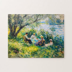 Familie genießt ein Picknick auf einer üppigen Wie