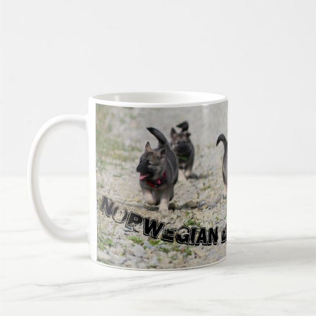 Famille d'Elkhound de Norvégien de tasse (Gauche)