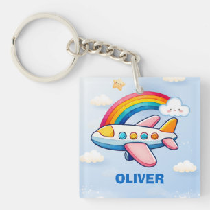Fantasievolle Passagierflugzeug mit Regenbogen Schlüsselanhänger