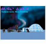 Far North Christmas - Kuvianak Innovia Fotoskulptur Magnet<br><div class="desc">Ein digitales Bild mit einem Iglu auf der Polareispackung, Schlittenhunden und einem Mann in einem Parka. Die Nordlichter leuchten über. Kuvianak Innovia ist frohe Weihnachten in der Sprache des Inuktitut (Eskimo). Über dem englischen Text erscheint Kuvianak Innovia im Inuktitut-Alphabet. Die Inuit werden gemeinhin als Eskimo bezeichnet, aber dieser Begriff wird...</div>