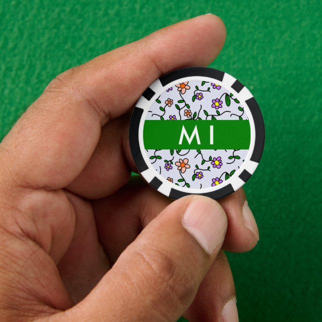 Farbenfrohe Blume, blauer Hintergrund, grün Pokerchips (Hand)