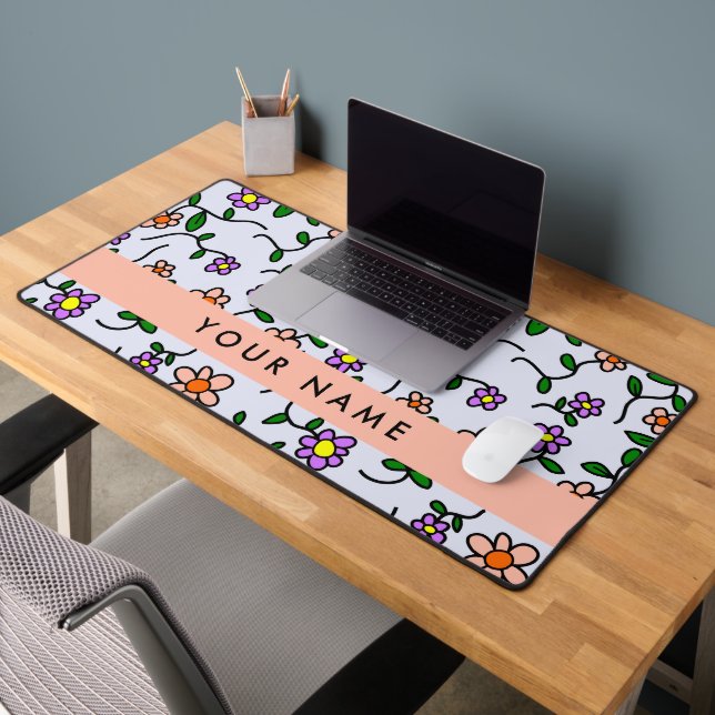 Farbenfrohe Blume, blauer Hintergrund, orange Schreibtischunterlage (Büro 2)