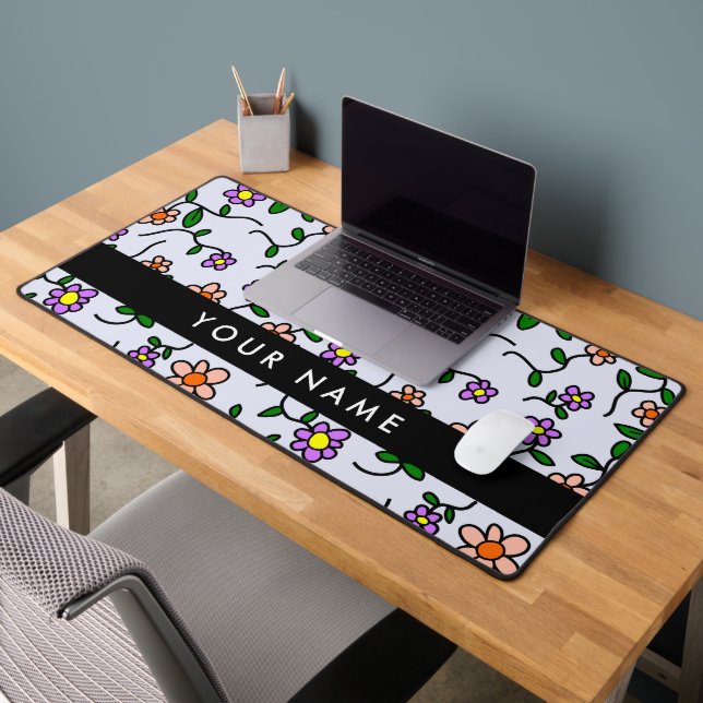 Farbenfrohe Blume, blauer Hintergrund, schwarz Schreibtischunterlage (Büro 2)