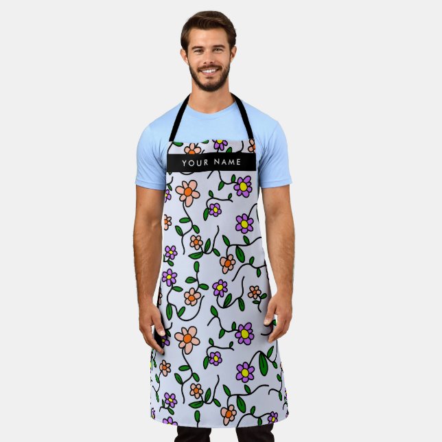 Farbenfrohe Blume, blauer Hintergrund, schwarz Schürze (Getragen)