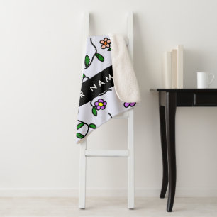 Farbenfrohe Blume, blauer Hintergrund, schwarz Sherpadecke