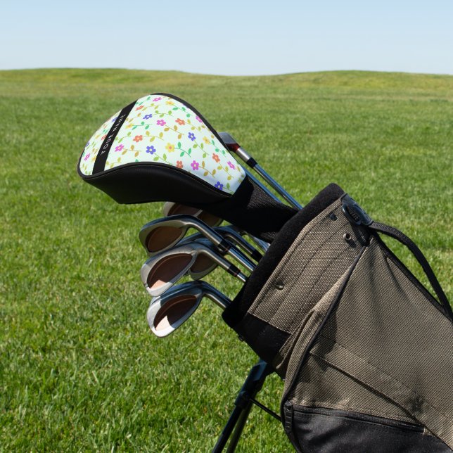 Farbenfrohe Blume, hellgrüner Hintergrund, schwarz Golf Headcover (In SItu)