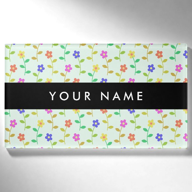 Farbenfrohe Blume, hellgrüner Hintergrund, schwarz Namenschild (Vorderseite)
