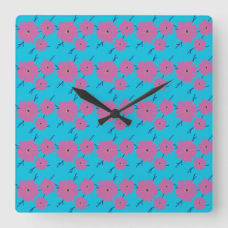 Farbenfrohe Blume Muster auf blauem Hintergrund Quadratische Wanduhr