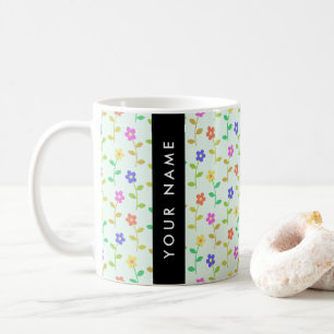 Farbenfrohe Blumen, hellgrüner Hintergrund, Schwar Kaffeetasse