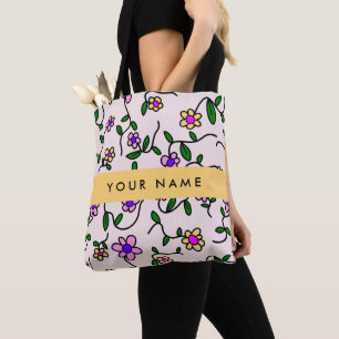 Farbenfrohe Blumen, rosa Hintergrund, gelb Tasche