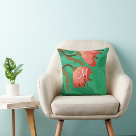 Farbenfrohe Flora und Blattrot auf Grün Kissen