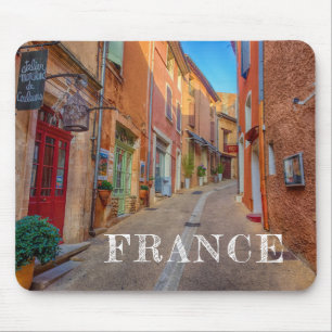 Farbenfrohe französische Hügellandschaftsstadt Mousepad