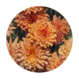 Farbenfrohe gelbe Blumen, gemildertes Glas Schneidebrett