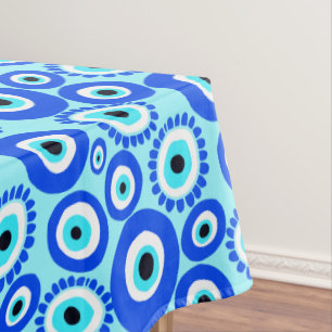 Farbenfrohe griechische Augapattern auf Aqua Blue Tischdecke