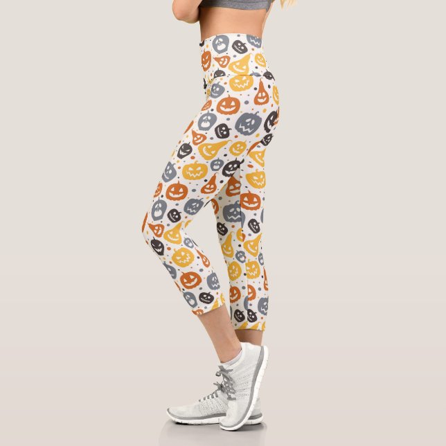 Farbenfrohe Jack-O'-Lantern-Gesichtsmuster Capri Leggings (Links)