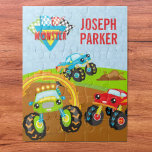 Farbenfrohe Kleinkinder-Monster-LKW mit Vorname<br><div class="desc">Mit diesem niedlichen Puzzle mit drei farbenfrohen Monster-LKWs können Sie Ihrem kleinen Jungen ein wenig Spaß machen. Es gibt einen grünen Monster-LKW, der durch einen Ring des Feuers fährt, einen roten Monster-LKW, der zusieht, und einen blauen Monster-LKW, der über einen schmutzigen Haufen springt. Es gibt auch karierte Racing-Fahnen in der...</div>