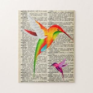 Farbenfrohe Kolibris auf einer alten Wörterbuchsei