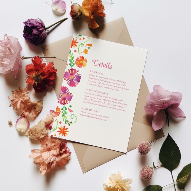 Farbenfrohe mexikanische Blumenfiesta - Details zu Einladung (Colorful Mexican Floral Fiesta Wedding Details Invitation on a white table with colorful flowers.)