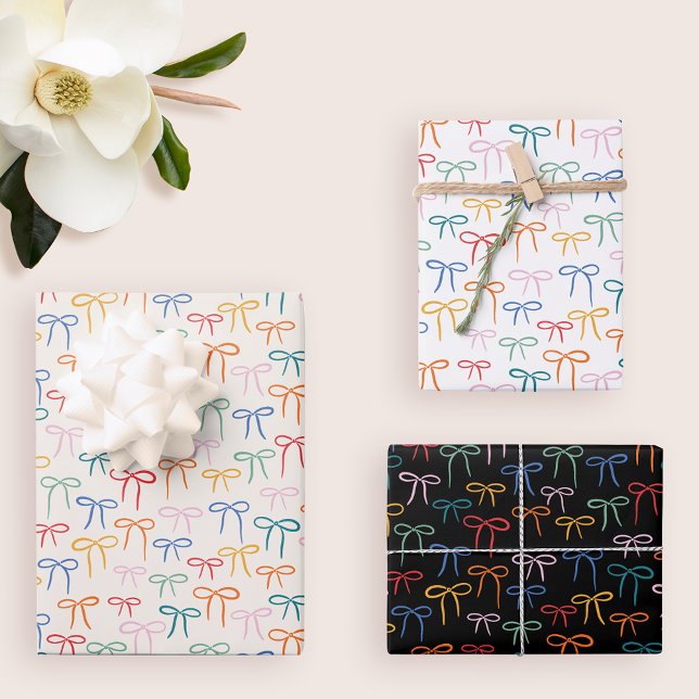 Farbenfrohe Muster Geschenkpapier Set (three gift wrapping paper sheets with a pattern of colorful simple bows)