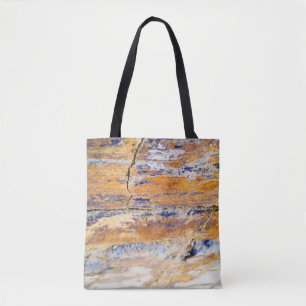Farbenfrohe Natursteinmauer in einem Steinbruch Tasche