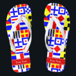 Farbenfrohe Nautic Signal Flags Roter Name Monogra Flip Flops<br><div class="desc">Farbenfrohe Nautical Signal Flags mit rotem Namen Monogram Ribbon Label Passen Sie dies mit Ihrem Namen, Monogramm oder anderen Text an. Sie können auch den Schriftart ändern, die Größe des Schriftartes und die Farbe des Schriftartes ändern, den Text verschieben, zusätzliche Textfelder hinzufügen usw. hinzufügen. Woll, dies in einer anderen Farbkombination...</div>