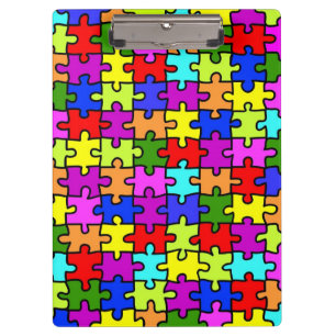 Farbenfrohe Puzzleteile aus Regenbogen Klemmbrett