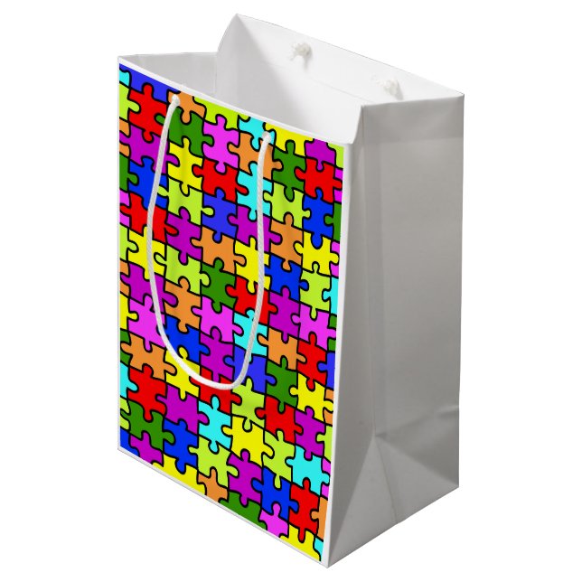 Farbenfrohe Puzzleteile aus Regenbogen Mittlere Geschenktüte (Vorderseite Schrägansicht)