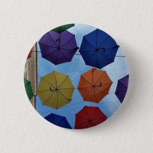 Farbenfrohe Regenschirme Button