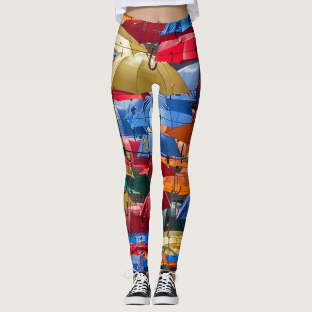 Farbenfrohe Regenschirme in himmelblau-orange rot Leggings (Vorderseite)