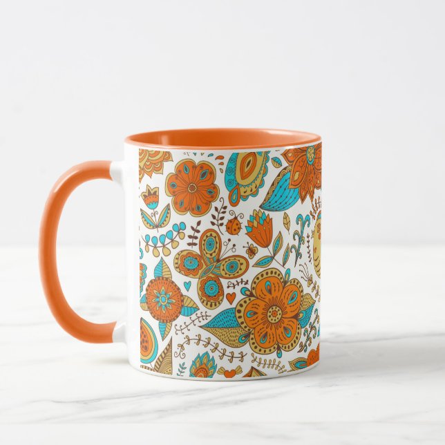 Farbenfrohe Retrovögel-Blume und Schmetterlingsmus Tasse (Links)