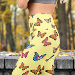 Farbenfrohe Schmetterlinge auf dem Canary Pattern  Capri Leggings<br><div class="desc">Mit diesen atemberaubenden Butterfly-Leggings verschmelzen Grace und Comfort Soar durch den Tag in mühelosen Stil! Die Leggings bieten eine Kombination aus Komfort und Eleganz. Freuen Sie sich auf ein kühnes und schönes Design. Egal ob Sie sich unterhalten oder raus und raus, sie geben eine einzigartige Aussage, die sicher ist, den...</div>