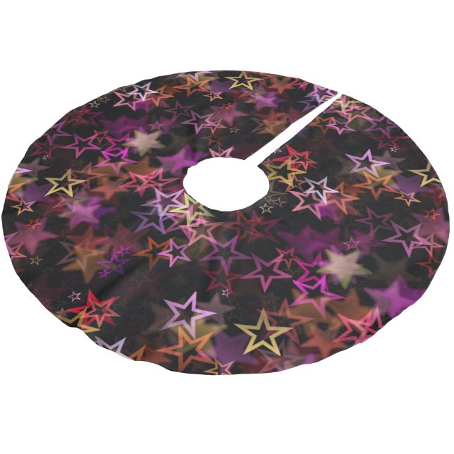 Farbenfrohe Sterne tanzen whimsisisch Polyester Weihnachtsbaumdecke (Schrägansicht)