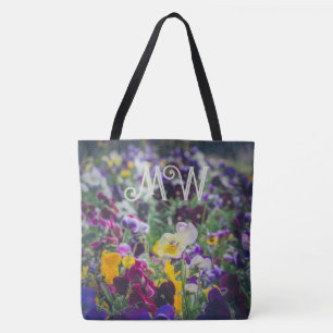Farbenfrohe Stiefmütterchen im Garten Tasche