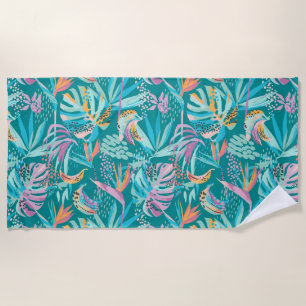 Farbenfrohe tropische Blume und Blätter Strandtuch