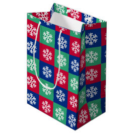 Farbenfrohe und helle Weihnachtsgeschenke Mittlere Geschenktüte